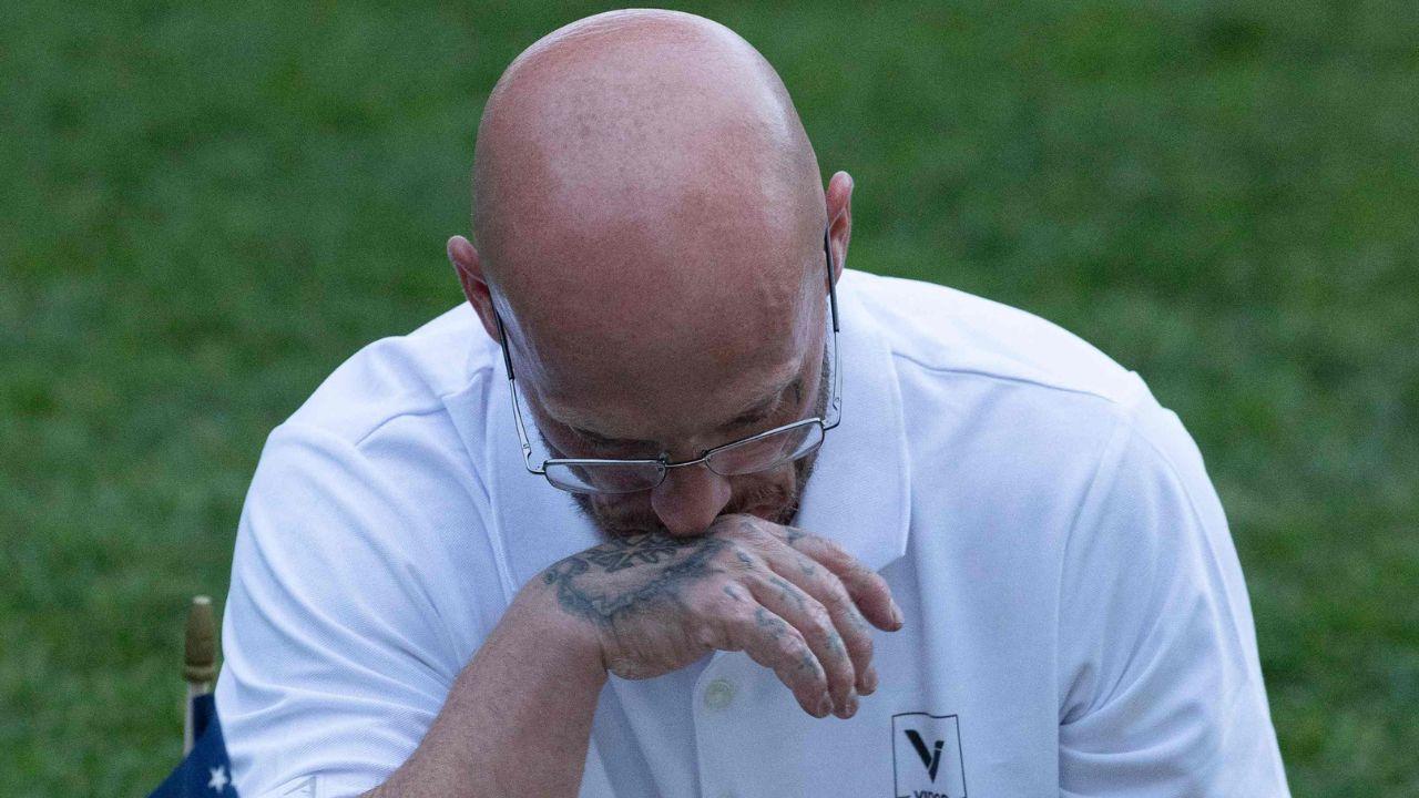 A man attending a vigil for youth activist and influencer Charlie Kirk